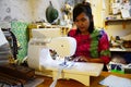 Thai Woman Sewing Machine in Night time