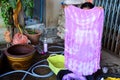 Thai woman show fabric tie batik dyeing yellow natural color
