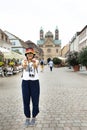 Thai woman show ice cream and eating on the road at Speyer town