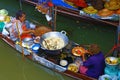 Thai women cooking on a boat Royalty Free Stock Photo