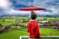 Thai women dressed in Thai Lanna costumes Walking in front of important tourist sites in Nan province, Thailand Royalty Free Stock Photo