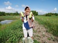 Thai women harvest agriculture winter melon or ash white gourd at grow plant crops