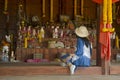 Thai women people visit and respect shrine of Phi Kon Nam or tradition of ghost carriage water at Ban Nasao in Chiang Khan