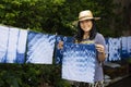 Thai women tie batik dyeing handkerchief indigo color Royalty Free Stock Photo