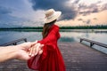 Thai women tourists Holding the hand of a lover to visit Nong Han in Sakon Nakhon Province, Thailand