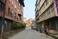 Thai women walking at Patan Durbar Square.