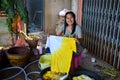 Thai women washing and clean clothes after tie batik dyeing natural color