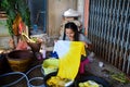 Thai women washing and clean clothes after tie batik dyeing natural color