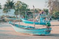 wooden Fishing boat on an island sand beach for Vacation and Beach travel cocnept