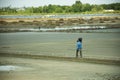 Thai worker people working and walking in salt farming at outdoor