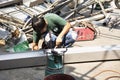 Thai workers people working made and build and manual welding structure of awning roof at front of house at construction site on Royalty Free Stock Photo