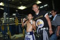 Thai young boxer and his mentor