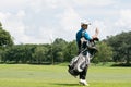 Thai young golf player in golf course and prepare for practice time before enter in golf tournament in Chiang rai,Thailand