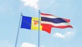 Thailand and Andorra, two flags waving against blue sky Royalty Free Stock Photo