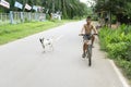 Thailand 10/ 24 / 2020 Asian boy riding a bycycle on Thailand country road in Nakonsitammrach soth , Thailand