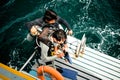 Student preparing jump to the sea for scuba diving test at Samaesarn Island