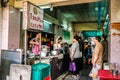 People Line Up At The Very Busy Jok Prince Porridge Shop In Old Bangkok, Thailand