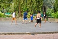 Boys play sports at the Park. Children playing football in the street Royalty Free Stock Photo