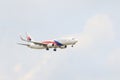 THAILAND,BANGKOK-MAR 3: Malaysia airlines plane flying above suv Royalty Free Stock Photo