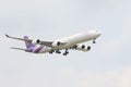 THAILAND,BANGKOK-MAR 3:Thai airways plane flying above suvarnabhumi airport runway and prepare to landing in bangkok on march Royalty Free Stock Photo