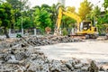 Modern excavator performs excavation work on the construction site Royalty Free Stock Photo