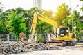 Modern excavator performs excavation work on the construction site Royalty Free Stock Photo