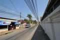 Road, transport, town, infrastructure, residential, area, sky, lane, car, street, neighbourhood, city, building, tree, asphalt, ve