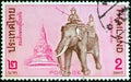 THAILAND - CIRCA 1970: A stamp printed in Thailand shows Queen Suriyothai riding elephant and Phra Chedi Sisuriyothai memorial