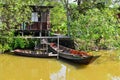 Thailand country house style in the garden beside river with boats Royalty Free Stock Photo