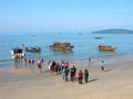 Thailand, crowd of tourists boarding a speedboat