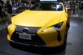 Thailand - Dec , 2018 : close up front view of Lexus LC 500 yellow color sports car presented in motor expo Nonthaburi Thailand