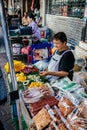 Thailand elderly woman selling food