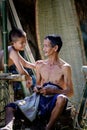 Thailand Father and son are working hand made Basket bamboo or f Royalty Free Stock Photo