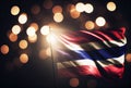 Thailand flag with colorful shiny bokeh light background. Nation flag in the dark with illumination light. National day concept.