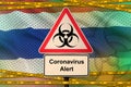 Thailand flag and Covid-19 biohazard symbol with quarantine orange tape. Coronavirus or 2019-nCov virus concept