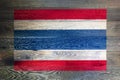 Thailand flag on rustic old wood surface background Royalty Free Stock Photo