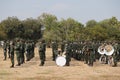 Thailand, 11 Jan 2022, a group of male soldiers wearing masks, stand in line for military training outdoors in the morning.