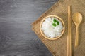 White rice, cooked white rice, cooked plain rice in wooden bowl with spoon and chopsticks, Organic rice on the rustic wooden and Royalty Free Stock Photo