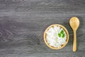 White rice, cooked white rice, cooked plain rice in wooden bowl with spoon and Organic rice on the rustic wooden background Royalty Free Stock Photo