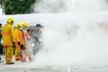 Thailand : July 30, 2019 :Peoples preparedness for fire drill and training to use a fire safety tank in the hospital.Udonthani,