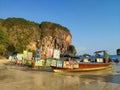 Thailand, Krabi aonang beach- February 19, 2019: floating food market. Fast food boats on the beach at low tide