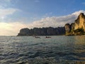 Thailand, Krabi - February 16, 2019: people kayaking around the rocks