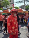 Thailand: Man with the eyelet hat, glass and red close for the Chines New Year at Bangkok.