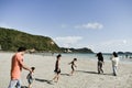 Children run to the beach together at Namsai beach Sattahip District Thailand