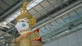 THAILANDÃ¢â¬â13 MARCH 2021: A statue sculpture of guardian Yakshas at the Suvarnabhumi Airport in Bangkok is wearing protective mask