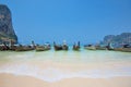 Thailand - May 5, 2016 : Long tail boats wait for tourists at Railay Beach West, Krabi, Thailand Royalty Free Stock Photo