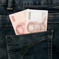 Thailand money bill in jean pocket Royalty Free Stock Photo