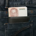 Thailand money bill in jean pocket Royalty Free Stock Photo