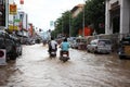 Thailand Monsoon , People on motorcycle Royalty Free Stock Photo