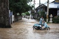 Thailand Monsoon , People walking through flood Royalty Free Stock Photo